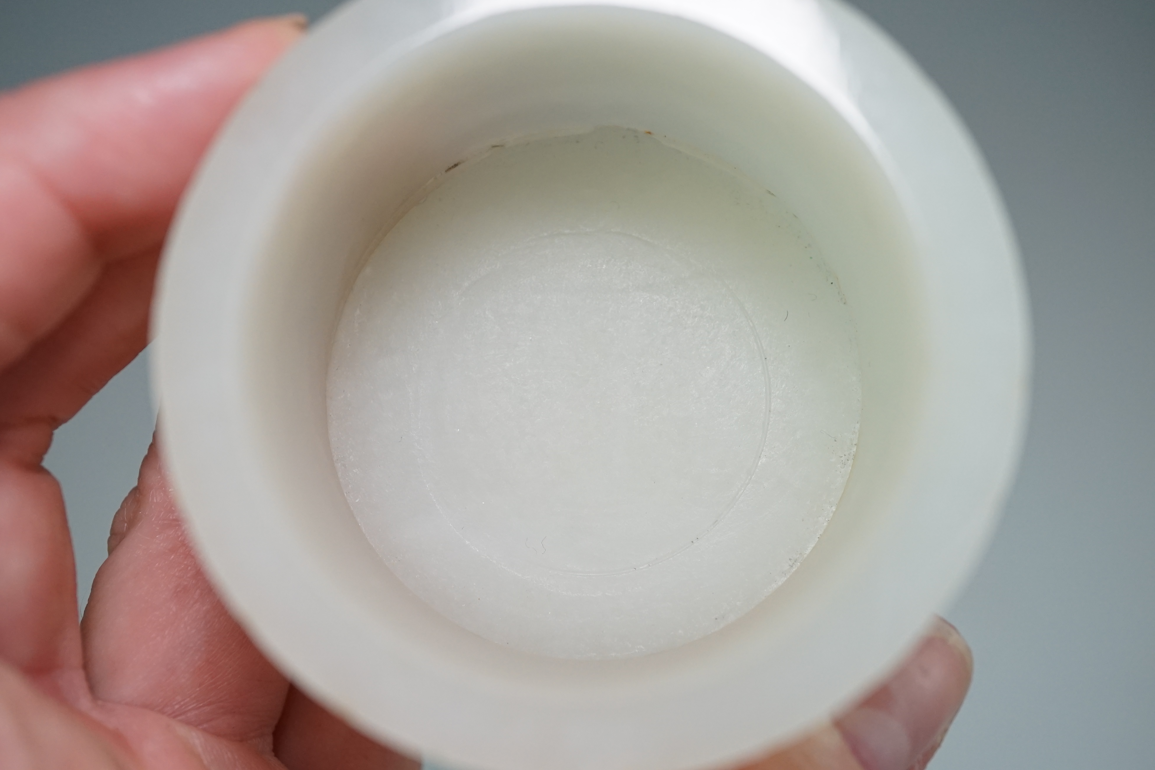 A Chinese white jade water pot, modelled as a bucket or tub, 19th century